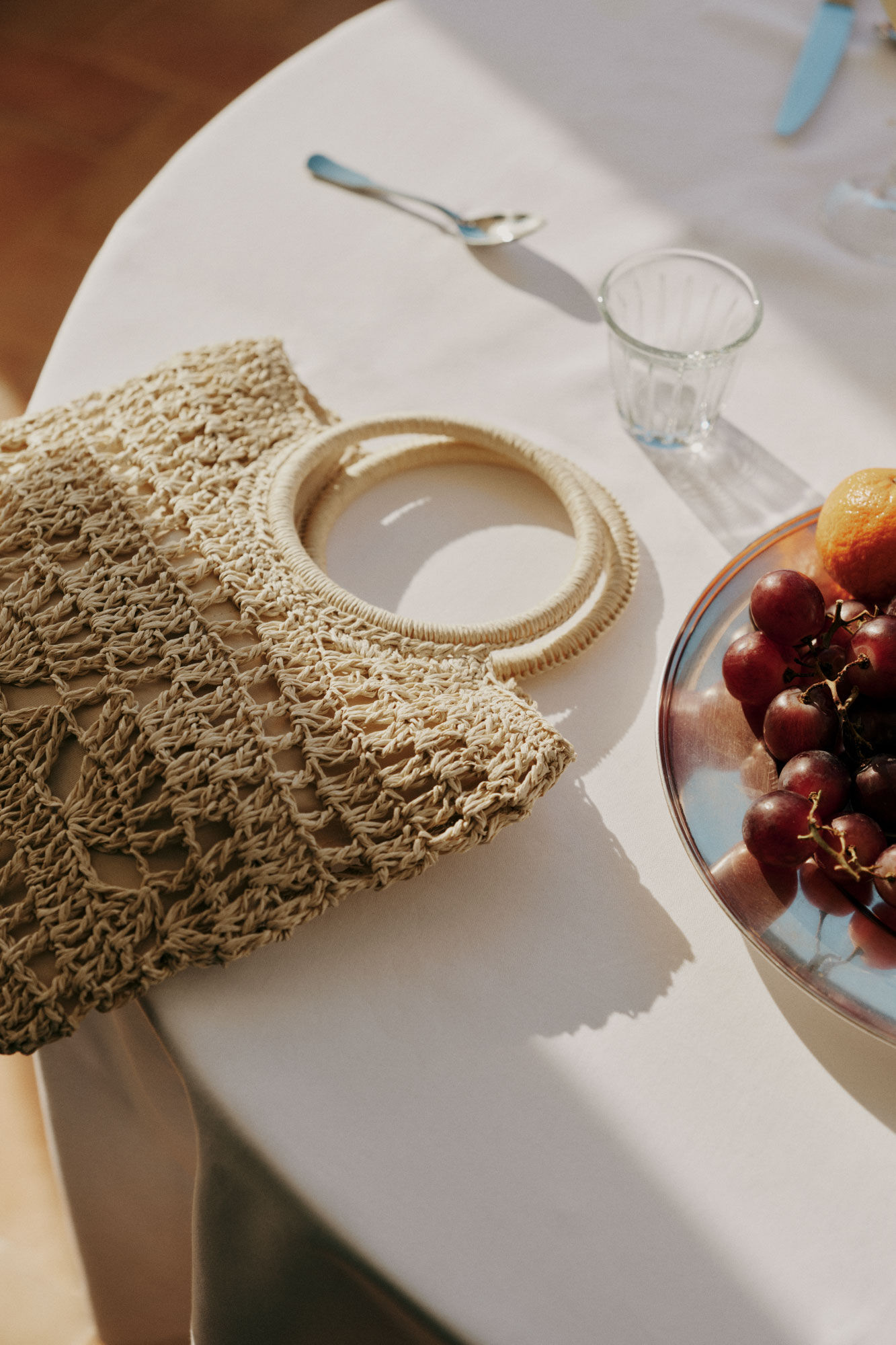 Cortefiel Raffia braided pouch