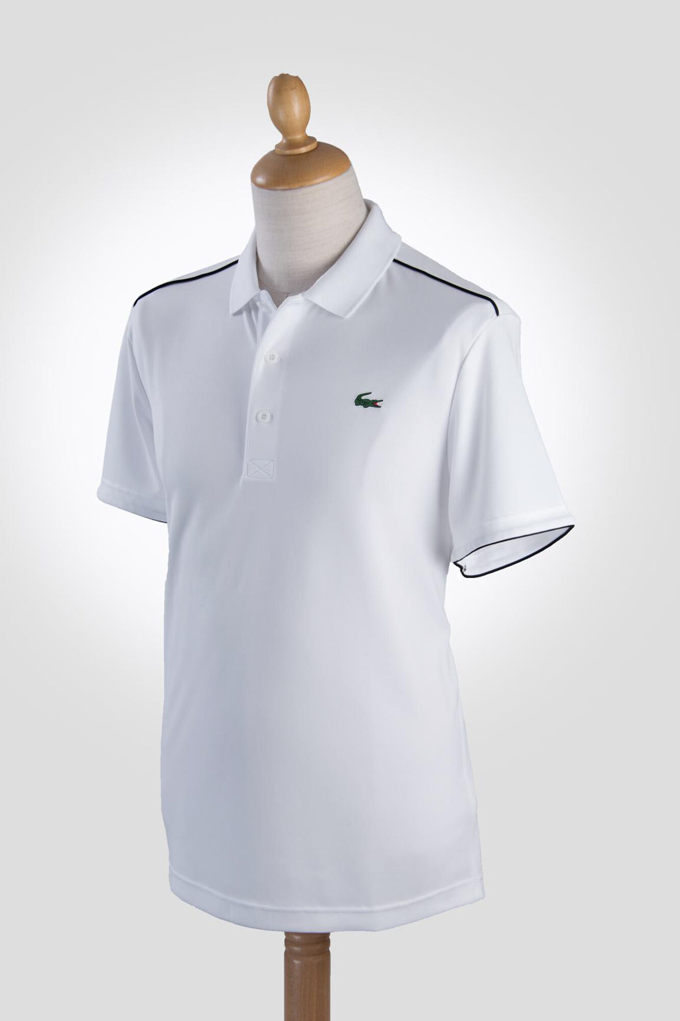 Lacoste Polo con ribetes en contraste en los hombros y los extremos de las mangas